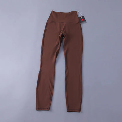Women's high-waisted yoga pants with sculpting peach lift, buttery soft fabric for running and training.