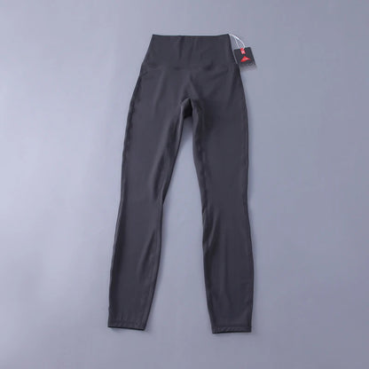 Women's high-waisted yoga pants with sculpting peach lift, buttery soft fabric for running and training.