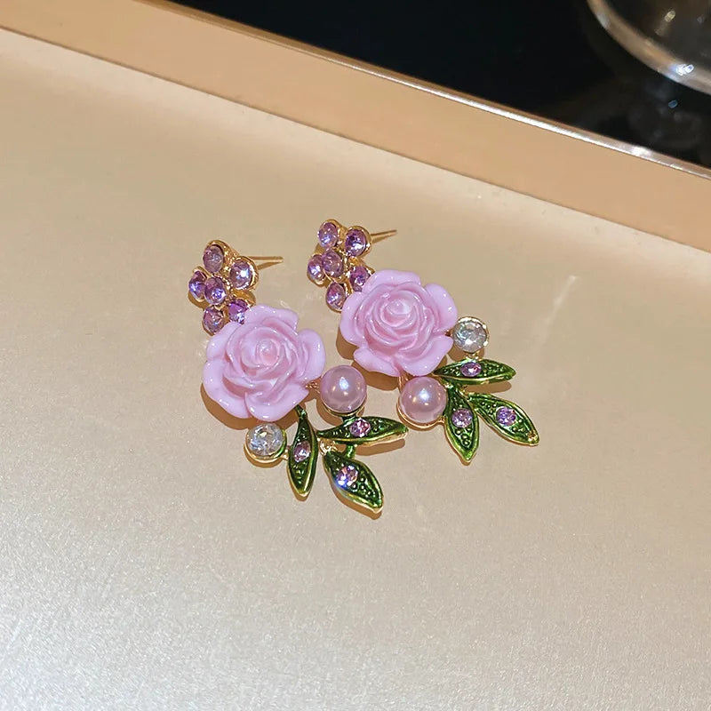 Flowers and leaves set with diamonds and pearl earrings and necklace set