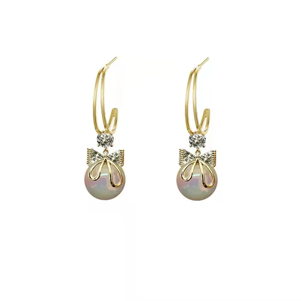 Sweet Earrings High End Feeling Pearl Bow Earrings Diamond Studded Earrings Fashionable Temperament Earrings And Earrings