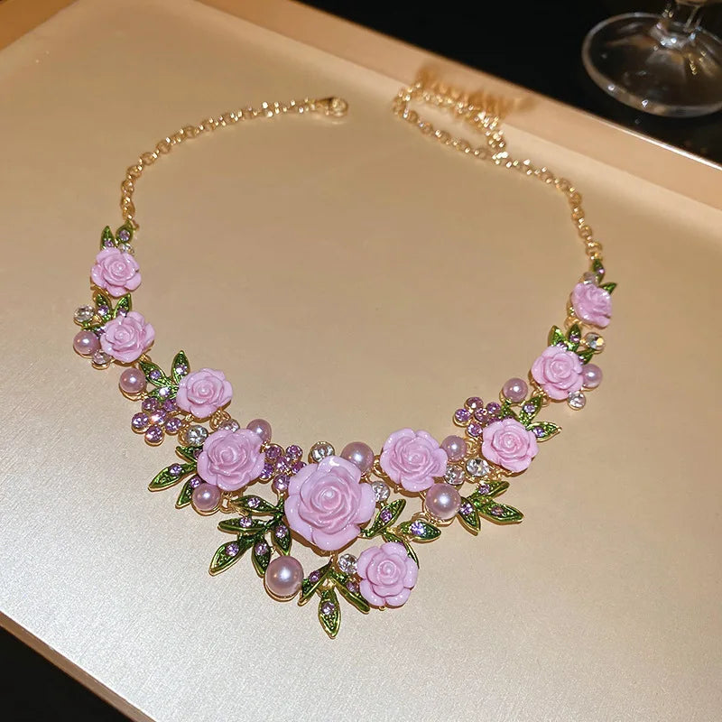 Flowers and leaves set with diamonds and pearl earrings and necklace set